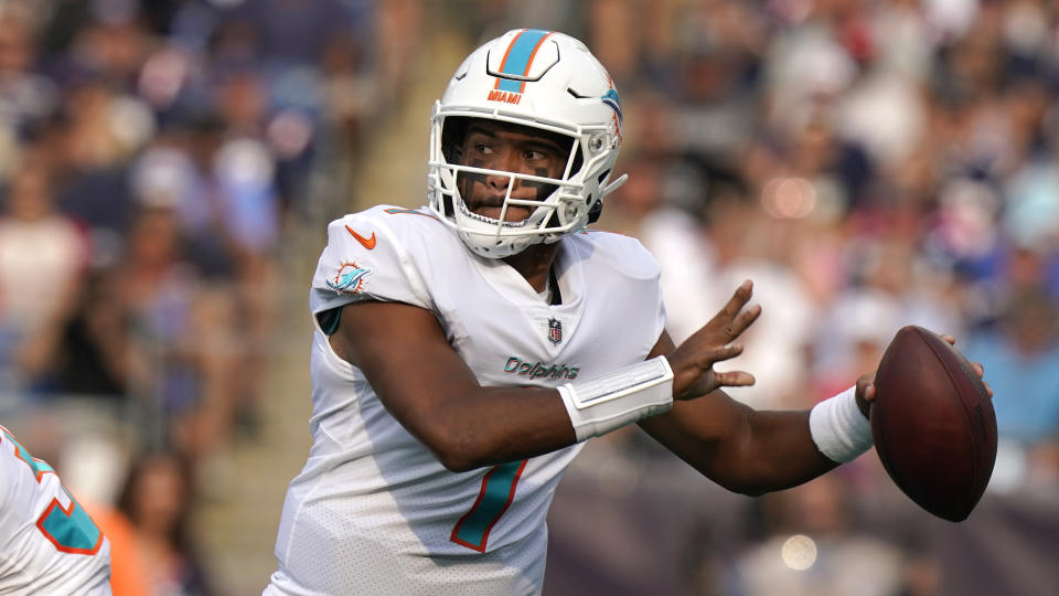 Miami Dolphins quarterback Tua Tagovailoa (1) looks to pass during the first half of an NFL football game against the New England Patriots, Sunday, Sept. 12, 2021, in Foxborough, Mass. (AP Photo/Steven Senne)
