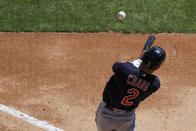 Cleveland Indians' Yu Chang hits the ball for a single during the third inning of a baseball game against the Cincinnati Reds in Cincinnati, Sunday, April 18, 2021. (AP Photo/Aaron Doster)