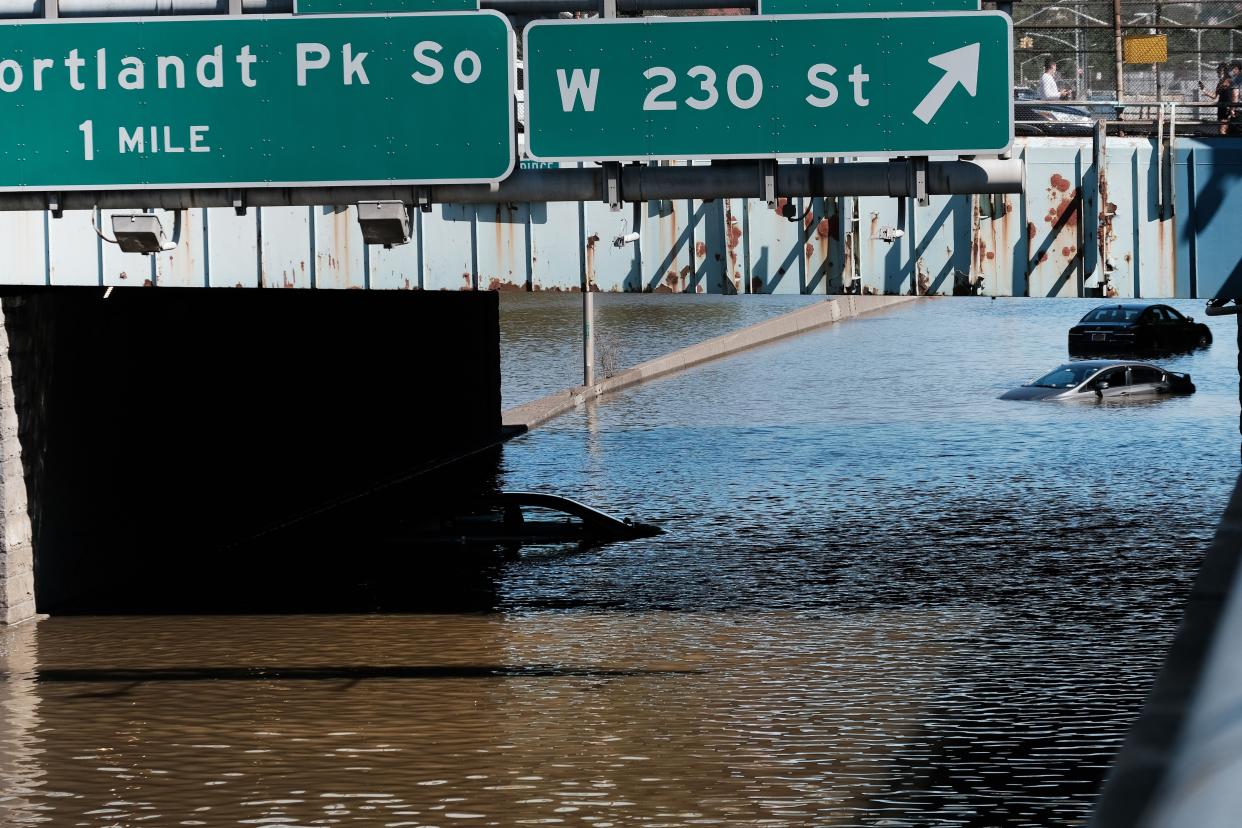 Cars sit abandoned on a flooded highway in the Bronx following as night of heavy wind and rain from the remnants of Hurricane Ida  on Sept. 2, 2021 in New York City.