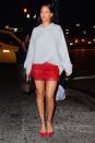 <p>In a grey sweatshirt, red fringed skirt, gold hoop earrings and chain necklace, red pointed-toe ankle strap heels and a Louis Vuitton bag while out in NYC. </p>