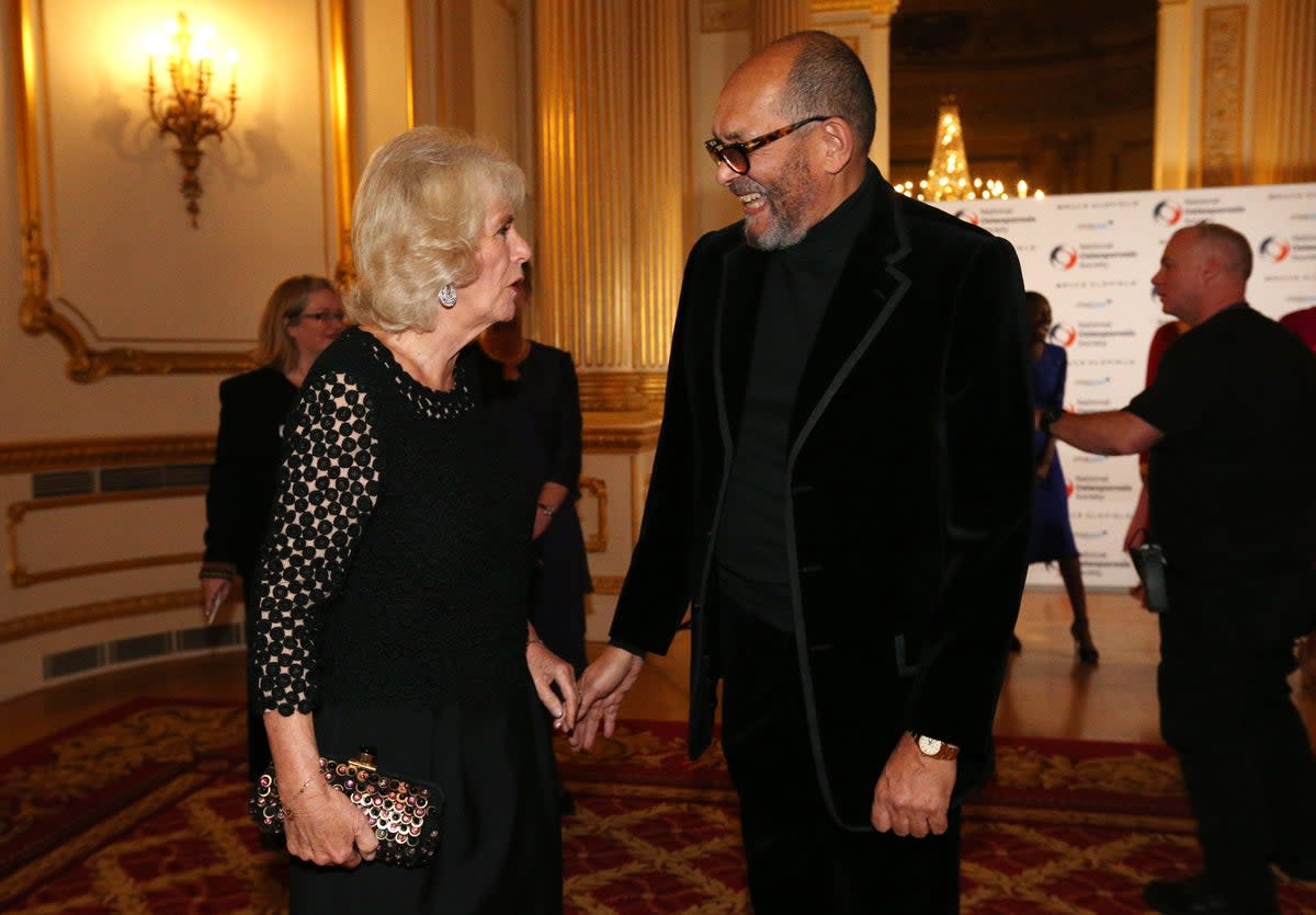 Bruce Oldfield is greeted by Camilla, Duchess of Cornwall during  the Bruce Oldfield Fashion Show at Lancaster House in support of the National Osteoporosis Society on November 15, 2017 (Getty Images)