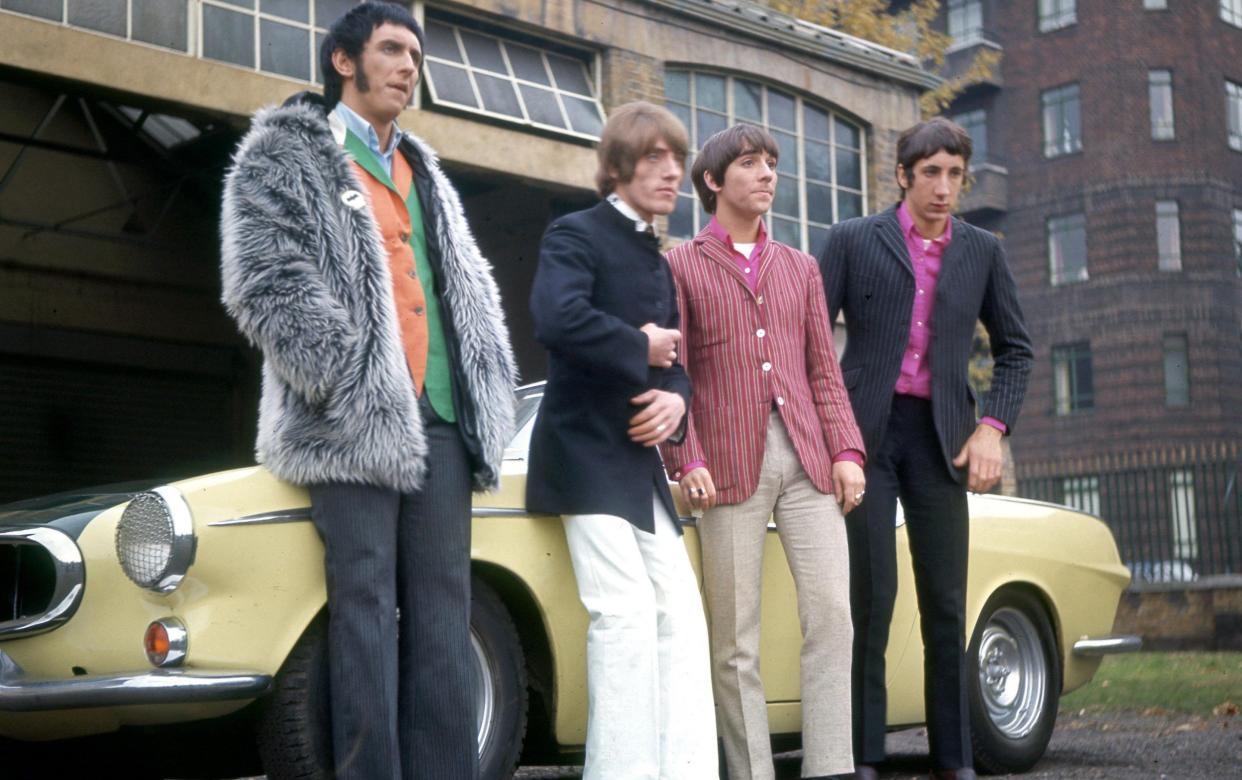 The Who are seen in front of Daltrey's Volvo P1800 Coupe in November 1966