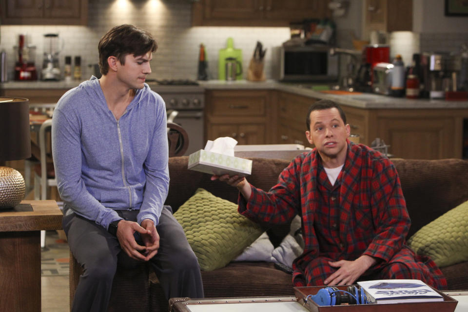 LOS ANGELES - JANUARY 23: "Cab Fare and a Bottle of Penicillin" --Alan gives Lyndsey the option of choosing between him and Larry.  Meanwhile, Jenny fears she and Brooke are growing apart, on TWO AND A HALF MEN, Thursday, Feb. 27 (9:31-10:01 PM, ET/PT) on the CBS Television Network. Pictured L-R: Ashton Kutcher as Walden Schmidt and Jon Cryer as Alan Harper. (Photo by Monty Brinton/CBS via Getty Images) 