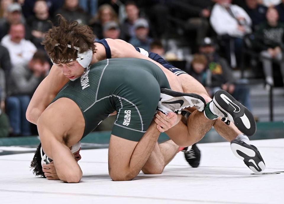 Penn State’s Levi Haines controls Michigan State’s Chase Saldate in their 157-pound bout of the Nittany Lions’ 35-0 win on Sunday at East Lansing, Mich. Haines reversed Saldate with one second left to win, 7-6, in ultimate tiebreaker No. 2.