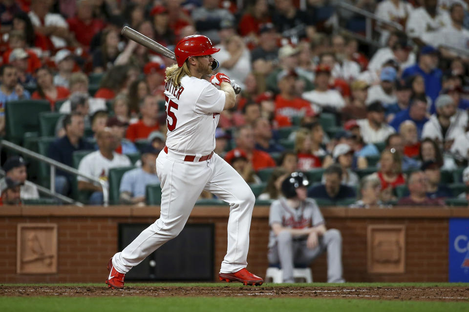 St. Louis Cardinals' Taylor Motter follows through on a double during the fifth inning of the team's baseball game against the Atlanta Braves Tuesday, April 4, 2023, in St. Louis. (AP Photo/Scott Kane)