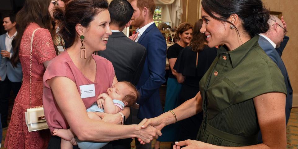 <p><strong>16 October </strong> Meghan greeted guests at the party.</p>