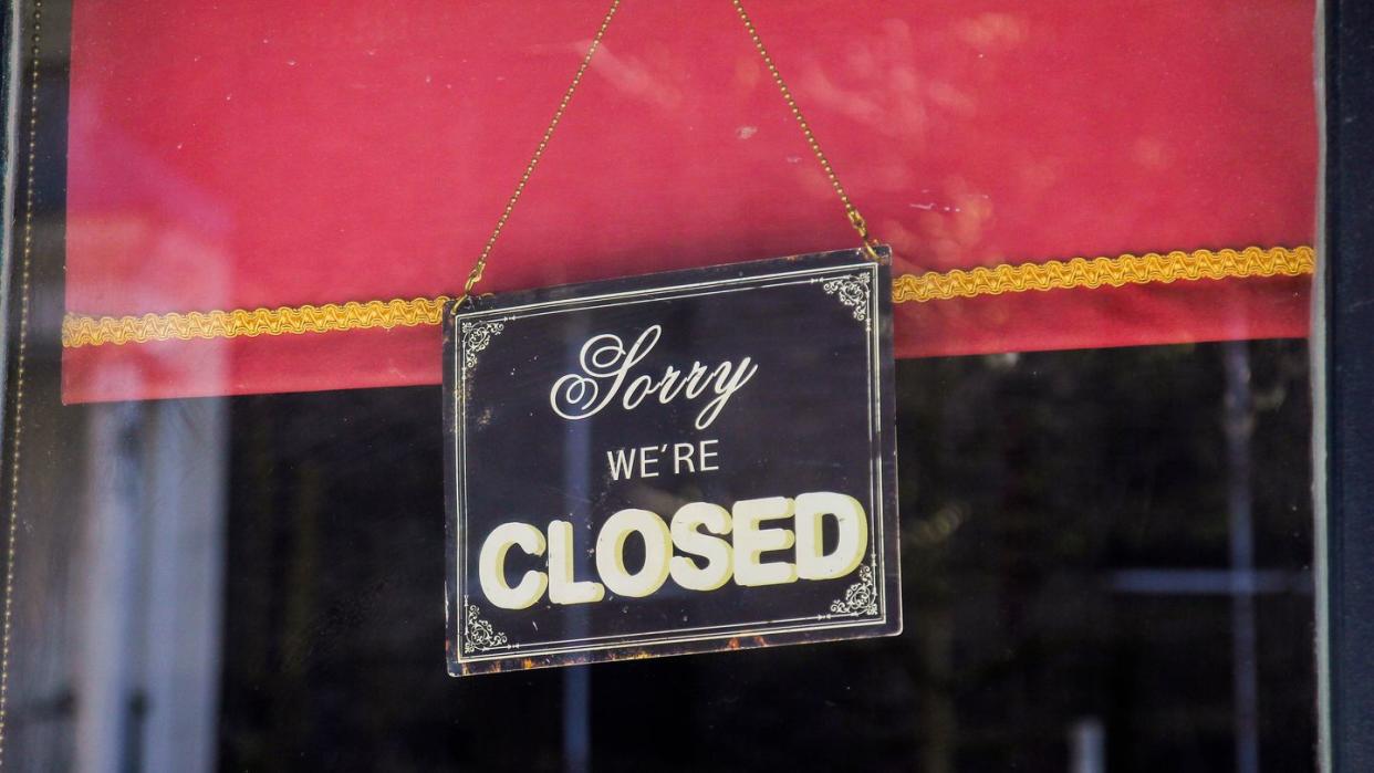 'sorry, we're closed' sign