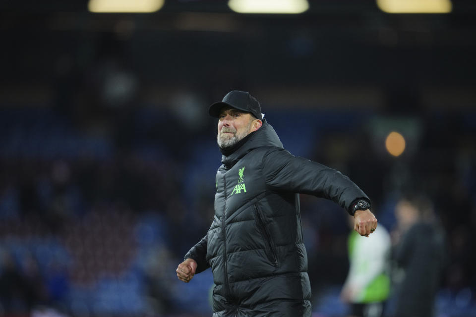 Liverpool's manager Jurgen Klopp celebrates after Liverpool won the English Premier League soccer match between Burnley and Liverpool at Turf Moor stadium in Burnley, England, Tuesday, Dec. 26, 2023. (AP Photo/Jon Super)