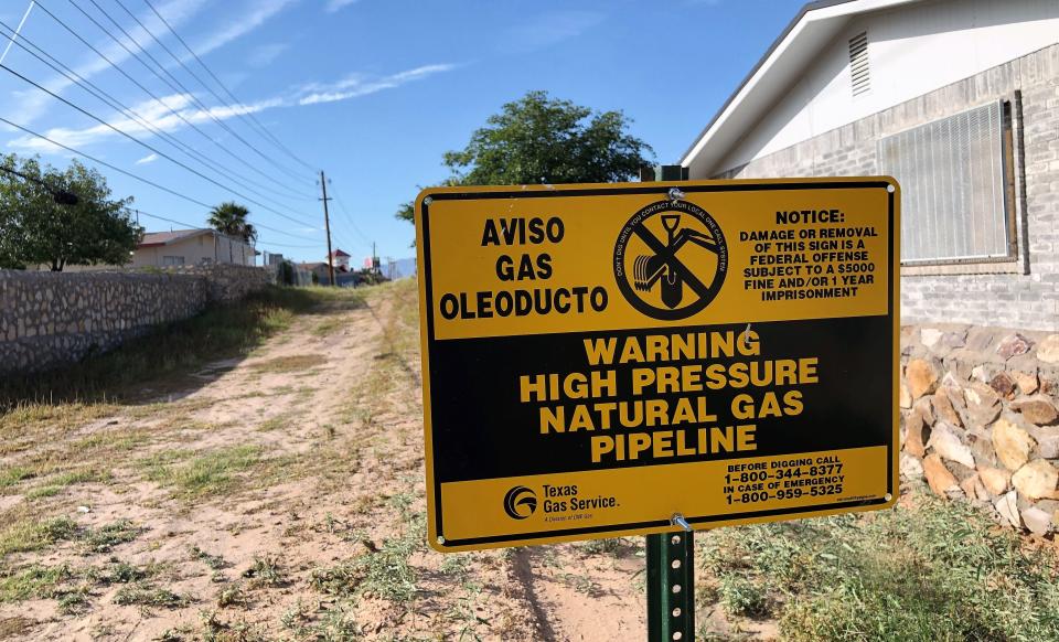 A sign marks the route of a Texas Gas Service natural gas pipeline  as seen Oct. 6 near Bywood Drive in an East El Paso neighborhood. The Austin-based utility is proposing a substantial increase in natural gas rates for the El Paso area.