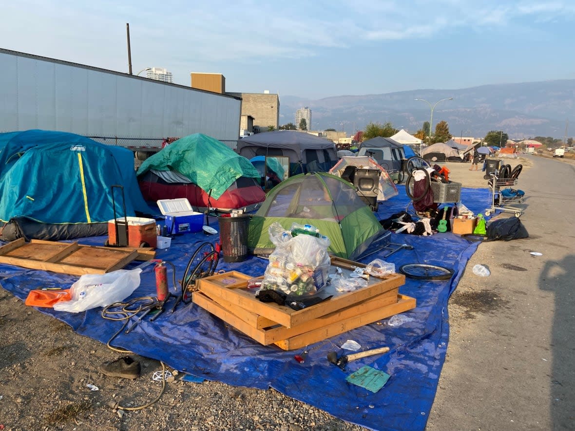 Homeless camping site on Rail Trail in the north end of downtown Kelowna, B.C. (Chris Walker/CBC - image credit)