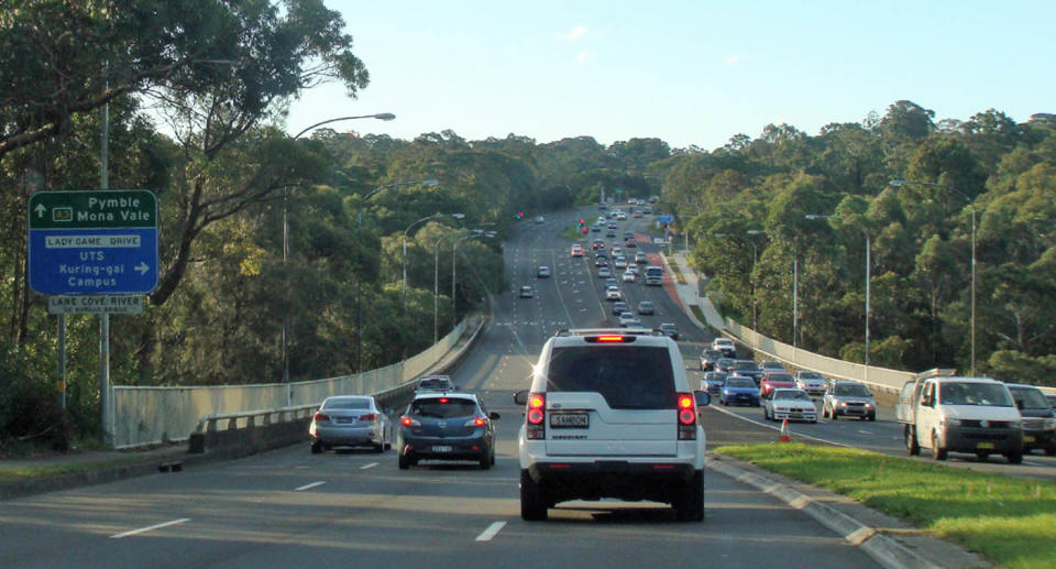 Car driving north along Lane Cove Road, Sydney. 