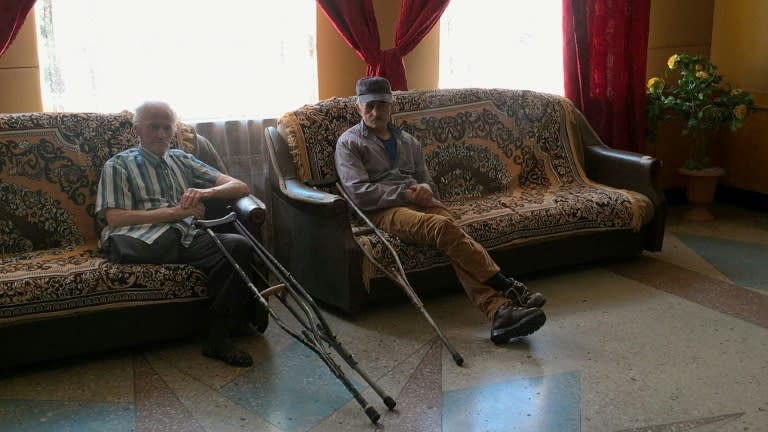 The care home took a direct hit from shelling in 2014 but many residents have little choice but to stay