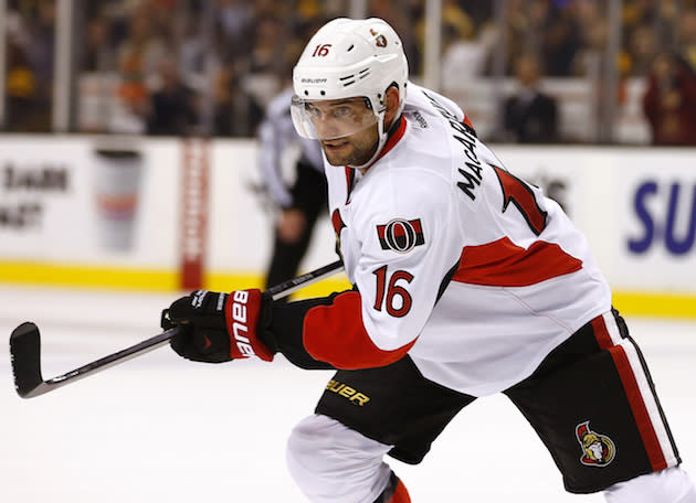 Ottawa Senators left wing Clarke MacArthur during the third period of Boston's 4-2 win in a NHL hockey game in Boston Saturday, Nov. 1, 2014. (AP Photo/Winslow Townson)