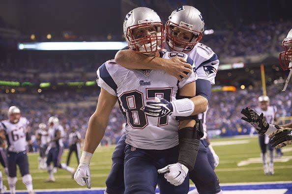 Football: New England Patriots QB Tom Brady (12) and Rob Gronkowski (87) victorious after scoring touchdown during game vs Indianapolis Colts at Lucas Oil Stadium.
Indianapolis, IN 11/16/2014
CREDIT: David E. Klutho (Photo by David E. Klutho /Sports Illustrated via Getty Images)
(Set Number: X158945 TK1 )