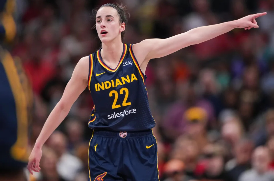 Indiana Fever guard Caitlin Clark (22) points to the other side of the court Wednesday, Sept. 4, 2024, during the game at Gainbridge Fieldhouse in Indianapolis.