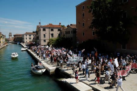 Venice's residents march during a protest in Venice, Italy, July 2, 2017. Picture taken on July 2, 2017REUTERS/Manuel Silvestri