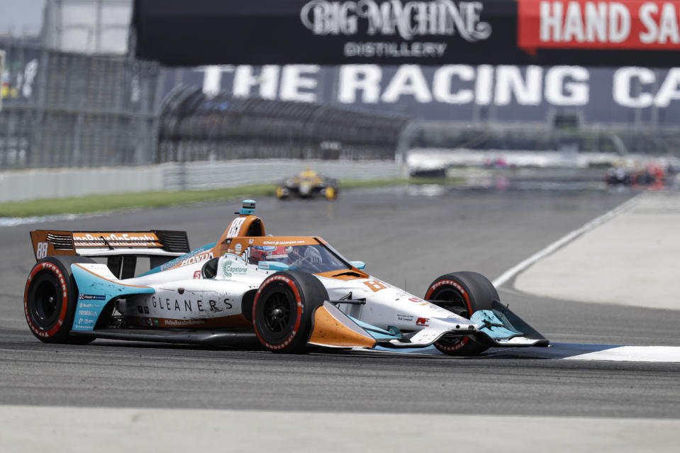 Race driver Colton Herta drives through a turn during the IndyCar auto race at Indianapolis Motor Speedway in Indianapolis, Saturday, July 4, 2020. (AP Photo/Darron Cummings)