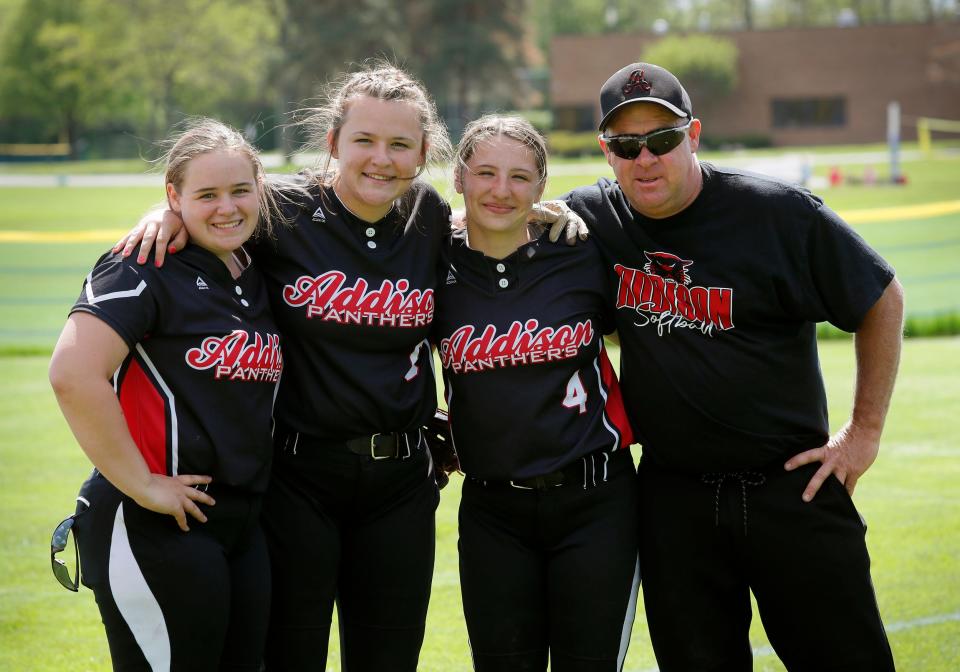 From left to right, Addison's Isabelle Patterson, Laci Mae Patterson, Lexi Patterson and co-head coach Justin Patterson pose for a picture together.