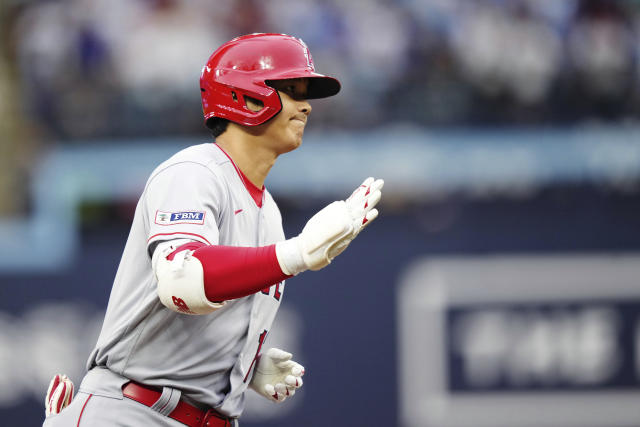 Ohtani homers in 3 straight at-bats over 2 games before being sidelined by  cramps — again