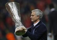 Football Soccer - Ajax Amsterdam v Manchester United - UEFA Europa League Final - Friends Arena, Solna, Stockholm, Sweden - 24/5/17 Manchester United manager Jose Mourinho celebrates with the trophy after winning the Europa League Reuters / Lee Smith Livepic