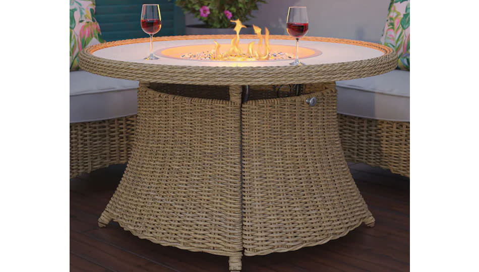 Save big on this backyard-elevating fire table from Lowe's. (Photo: Lowe's)