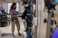 NASA commercial crew astronaut Sunita Williams runs a troubleshooting drill inside a mock ISS facility at the Johnson Space Center in Houston