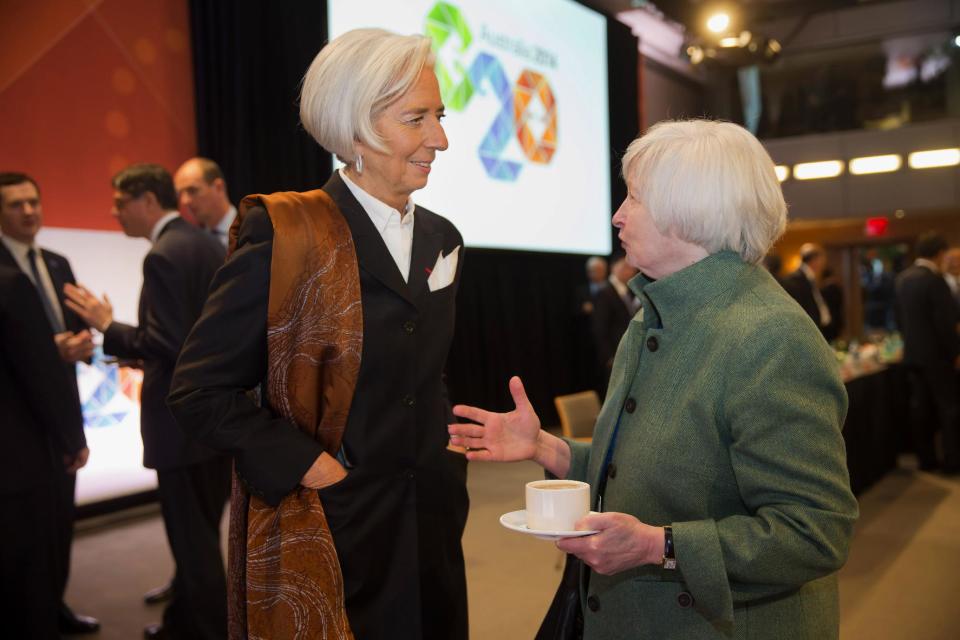 This handout photo provided by the International Monetary Fund (IMF) shows IMF Managing Director Christine Lagarde, left, talking with Federal Reserve Chair Janet Yellen prior to the G20 meeting at the IMF/World Bank Spring Meetings, Friday, April 11, 2014, at IMF Headquarters in Washington. (AP Photo/Stephen Jaffe, IMF)