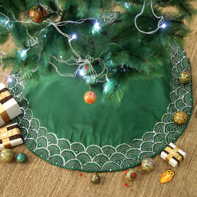 <p><a href="https://go.redirectingat.com?id=74968X1596630&url=https%3A%2F%2Fwww.novica.com%2Fp%2Fembroidered-satin-tree-skirt-in-emerald-from%2F314183%2F&sref=https%3A%2F%2Fwww.womansday.com%2Fhome%2Fdecorating%2Fg45446477%2Fbest-christmas-tree-skirts%2F" rel="nofollow noopener" target="_blank" data-ylk="slk:Shop Now;elm:context_link;itc:0;sec:content-canvas" class="link ">Shop Now</a></p><p>Embroidered Satin Tree Skirt</p><p>novica.com</p><p>$77.99</p><span class="copyright">Novica</span>