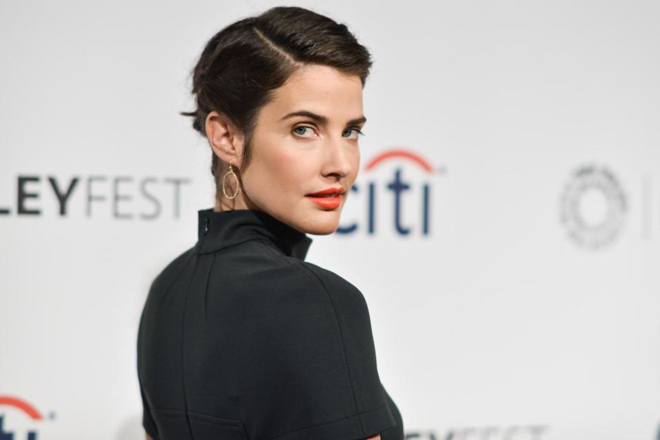 Cobie Smulders arrives at PALEYFEST 2014 - "How I Met Your Mother" Series Farewell on Saturday, March 15, 2014, in Los Angeles. (Photo by Richard Shotwell/Invision/AP)