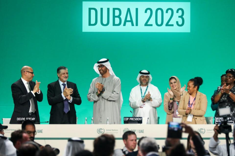 Cop28 leaders clap as nations agree deal to ‘transition away’ from fossil fuels (Getty Images)