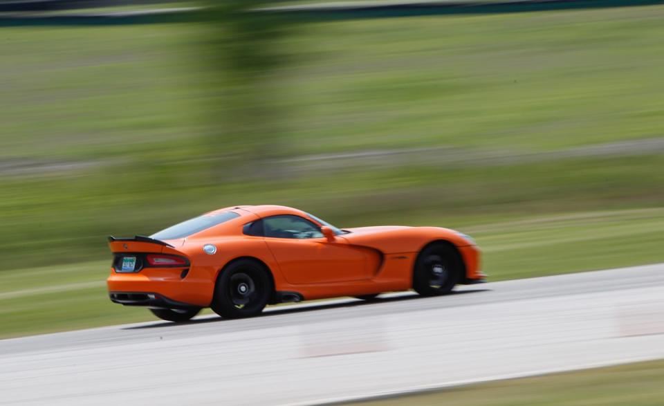 <p>Horsepower: 640; Weight: 3375 lb; Price as tested: $134,680<br><br></p><p>When car journos get together, a perennial conversation hobbyhorse is how crude and intimidating the Viper is compared with the Corvette or Europe’s computerized speedsters. But as with Excalibur, the legendary sword that is somewhat handicapped by its attached boulder, the Viper is a fearsome weapon once the right hands get a grip on it. <a rel="nofollow noopener" href="http://www.caranddriver.com/features/srt-viper-ta-at-lightning-lap-2014-feature" target="_blank" data-ylk="slk:READ MORE ››;elm:context_link;itc:0;sec:content-canvas" class="link ">READ MORE ››</a></p>