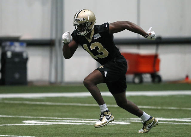 New Orleans Saints wide receiver Michael Thomas (13) applies a stiff arm to Seattle  Seahawks free safety Earl Thomas (29) en route to a 17 yard gain at the  Mercedes-Benz Superdome in