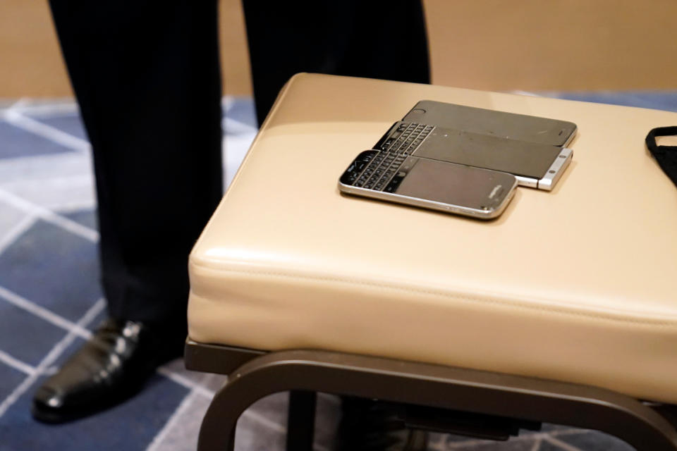 Three phones displayed by Tony Bobulinski, who says he is a former associate of Hunter Biden, on Oct. 22 in Nashville.