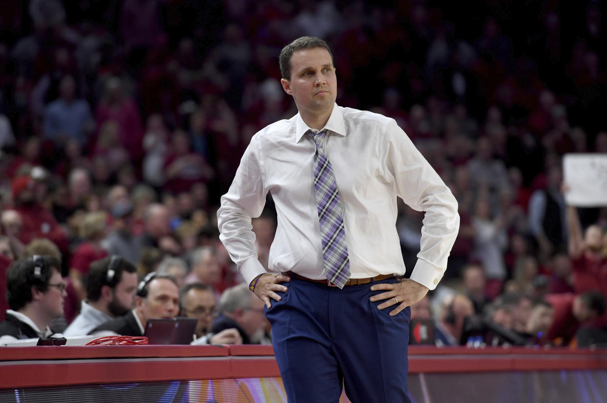 FILE - In this March 4, 2020, file photo, LSU coach Will Wade watches the team play Arkansas during an NCAA college basketball game in Fayetteville, Ark. NCAA enforcement officials say Wade is suspected of offering or providing “impermissible benefits” to 11 prospective recruits or people associated with them. The allegation is detailed in documents made public Wednesday, Aug. 26, by LSU. (AP Photo/Michael Woods, File)