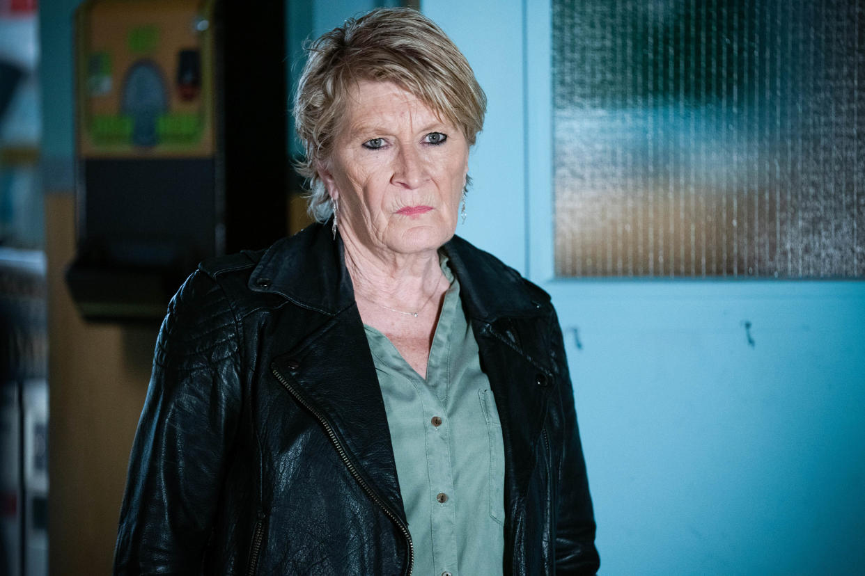  Shirley Carter wearing a black leather jacket. 
