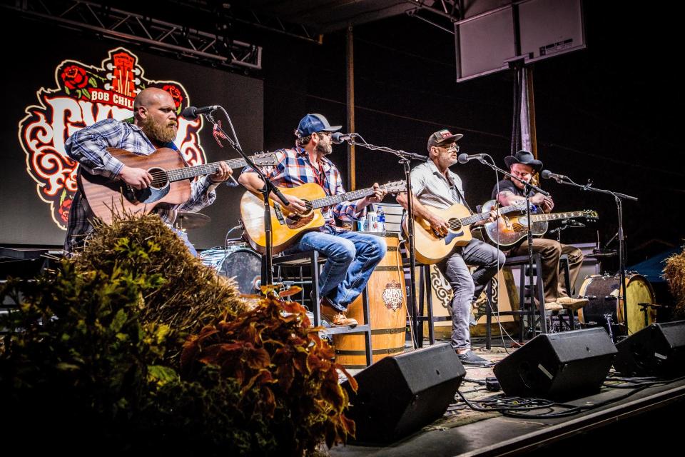 From left, Byron White, Gabe Marshall, Mike McClure and Kyle Nix perform at the 2022 Bob Childers' Gypsy Cafe songwriter festival in Stillwater.