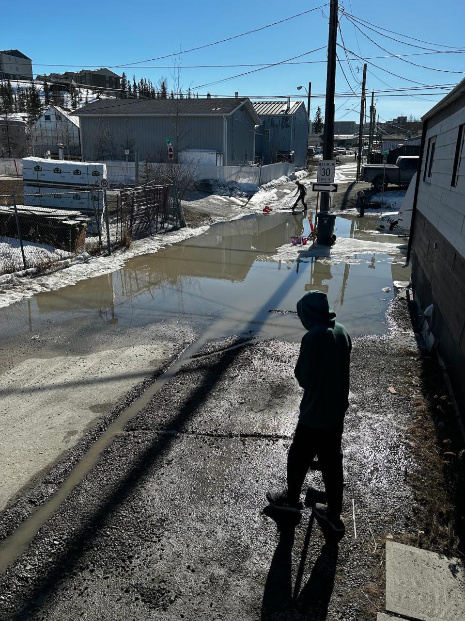 Water pooling in a residential neighbourhood of Yellowknife. The neighbourhood has dealt with seven water main breaks since February.