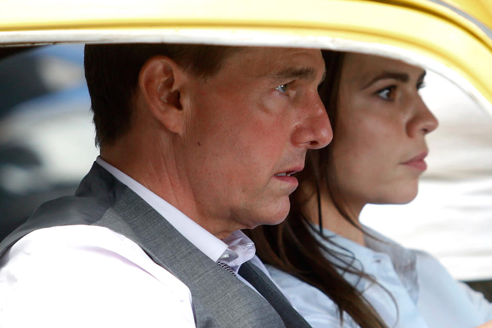 Actor Tom Cruise and actress Hayley Atwell in a yellow Fiat 500 on the set of the film Mission Impossible 7 shot in Via Nazionale. Rome (Italy), October 9th 2020 (Photo by Samantha Zucchi/Insidefoto/Mondadori Portfolio via Getty Images)