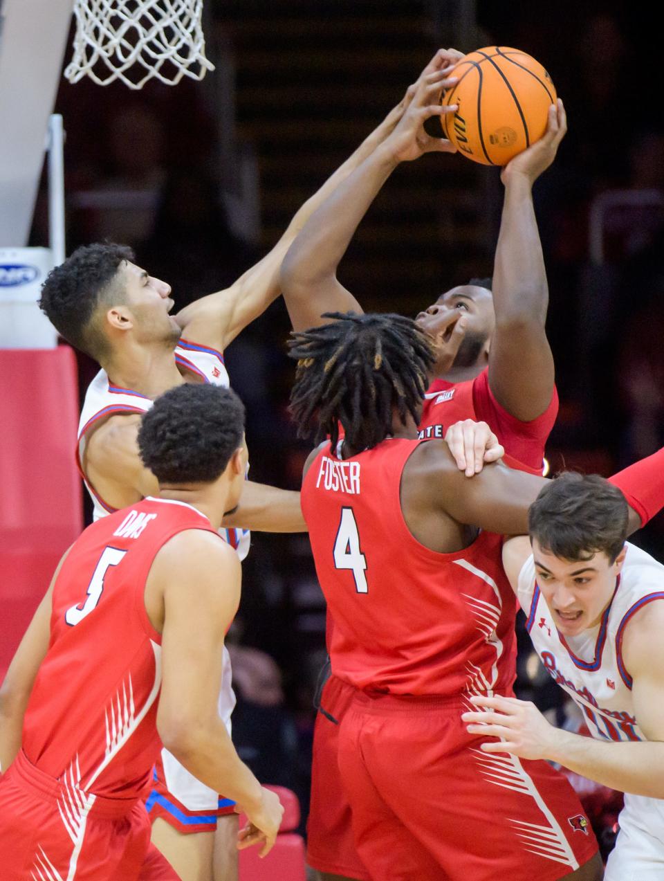 Bradley's Malevy Leons, left, tries to stop ISU's Chase Walker under the basket in the first half of their Missouri Valley Conference basketball game Saturday, Feb. 24, 2024 at Carver Arena in Peoria.