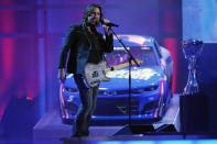 Jake Owen performs during the NASCAR Awards program Thursday, Dec. 2, 2021, in Nashville, Tenn. (AP Photo/Mark Humphrey)