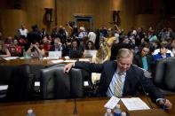 <p>Sen. Lindsey Graham, R-S.C. waits protesters are removed after disrupting a Senate Finance Committee hearing to consider the Graham-Cassidy healthcare proposal, on Capitol Hill, Monday, Sept. 25, 2017, in Washington. (AP Photo/Andrew Harnik) </p>