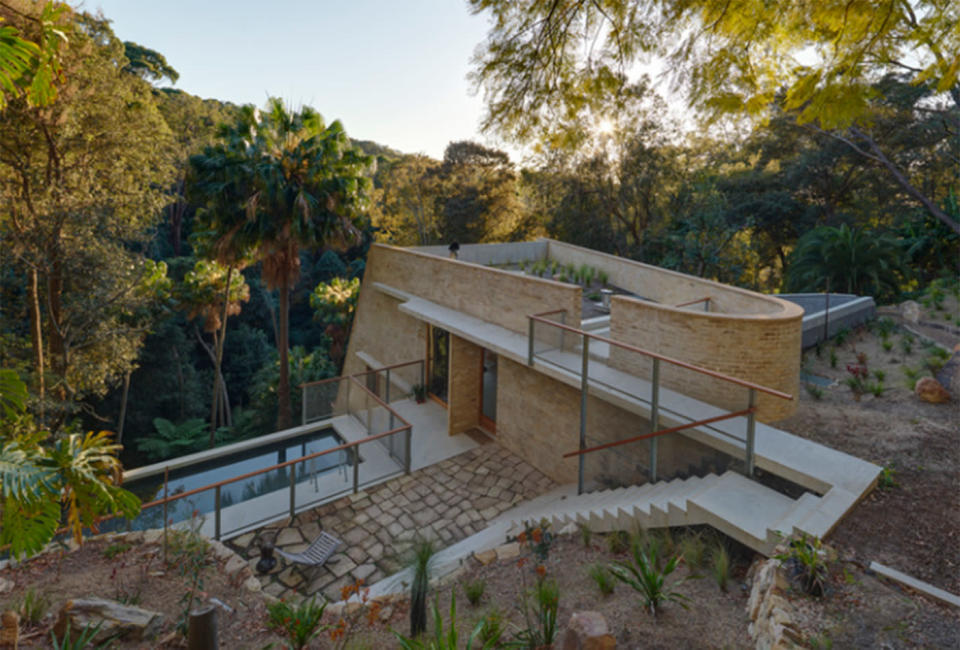 Designed by Peter Stutchbury Architecture, the 2018 Australia House of the Year features a luxurious in ground pool with bush land views