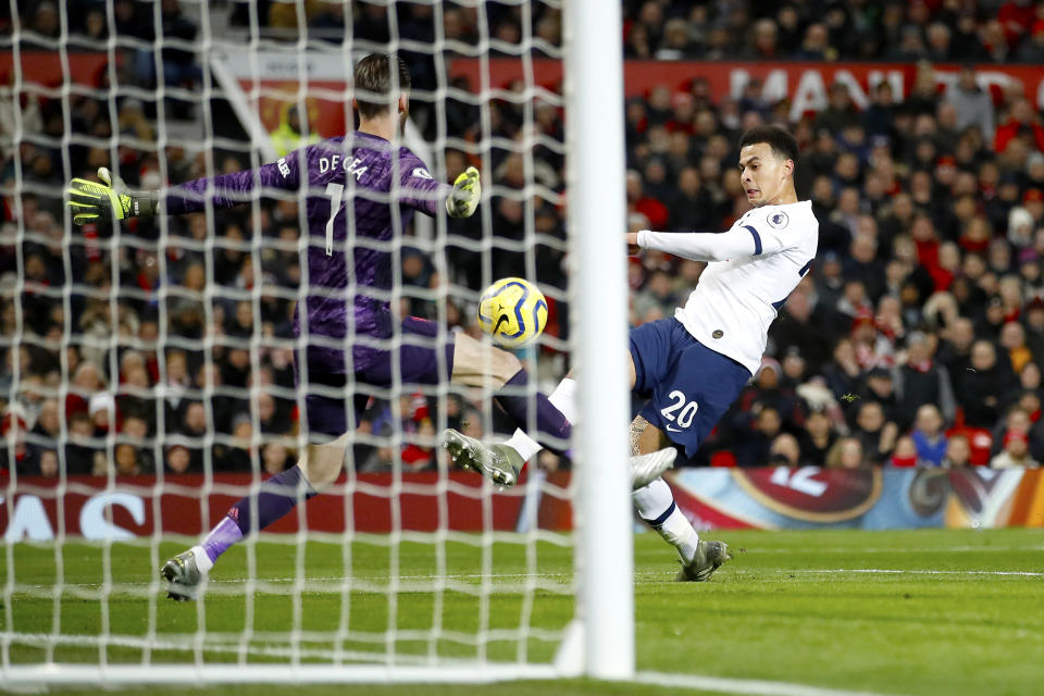 Tottenham Hotspur's Dele Alli scores his side's first goal of the game during the Premier League match at Old Trafford, Manchester. (Photo by Martin Rickett/PA Images via Getty Images)