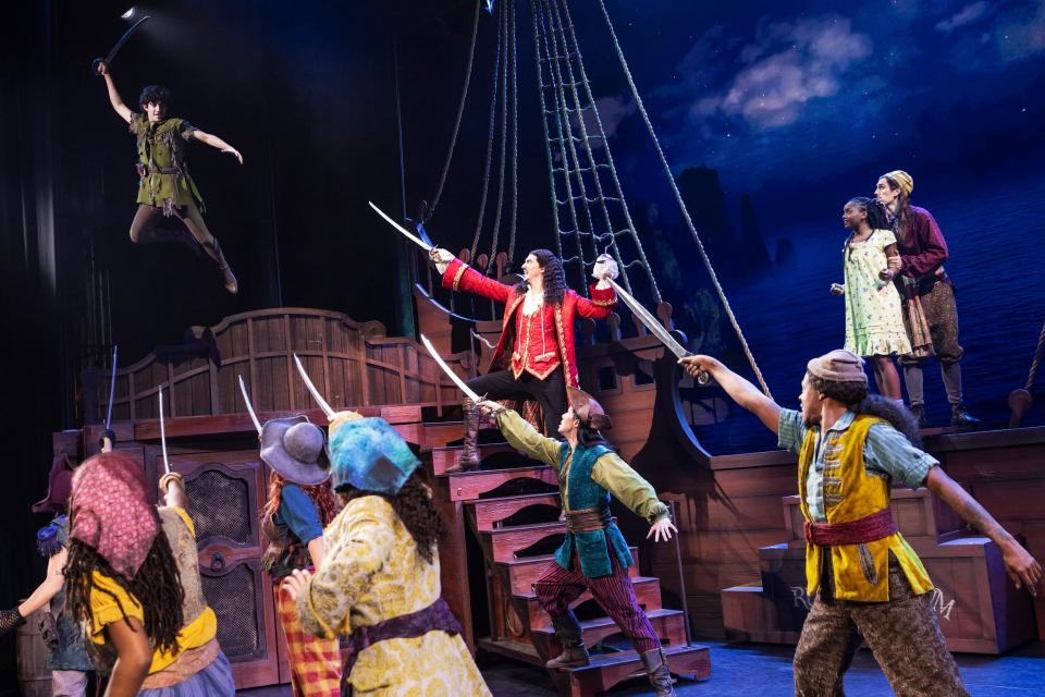 From left, Nolan Almeida stars as Peter Pan, Cody Garcia as Captain Hook, Hawa Kamara as Wendy and the company perform in the new adaptation of the musical "Peter Pan."