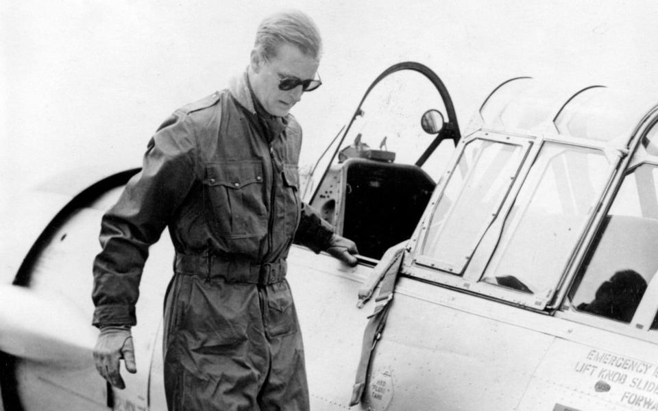 Prince Philip disembarks from an aircraft after a flight on May 4, 1953, at RAF White Waltham, Berkshire, where he was training for his wings.  - Keystone USA