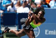 Aug 21, 2015; Cincinnati, OH, USA; Serena Williams (USA) returns a shot against Ana Ivanovic (not pictured) in the quarterfinals during the Western and Southern Open tennis tournament at the Linder Family Tennis Center. Mandatory Credit: Aaron Doster-USA TODAY Sports