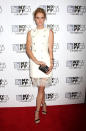 <p>Mackenzie Davis chose a white double breasted blazer dress with a lace hem paired with black open-toe heels and a metallic clutch for the New York Film Festival premiere of “The Martian.” </p>