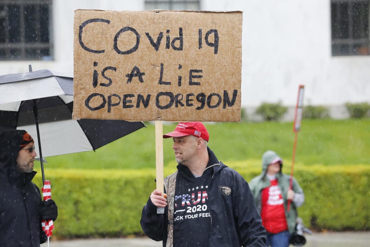 Image: Protestors Rally At Oregon State Capitol Against Stay-At-Home Order (Terray Sylvester / Getty Images)