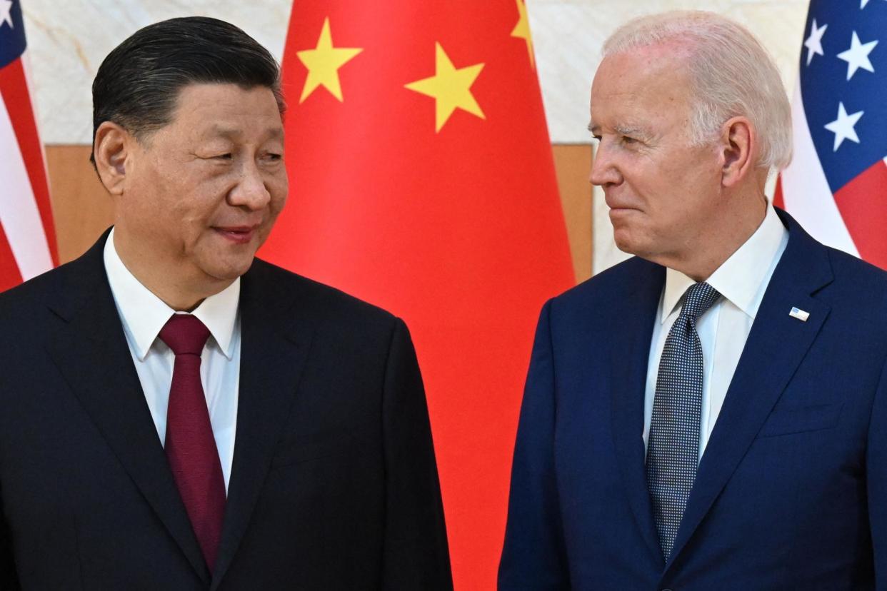 <span>Xi Jinping and Joe Biden meet on the sidelines of the G20 Summit in Indonesia, in November 2022.</span><span>Photograph: Saul Loeb/AFP/Getty Images</span>