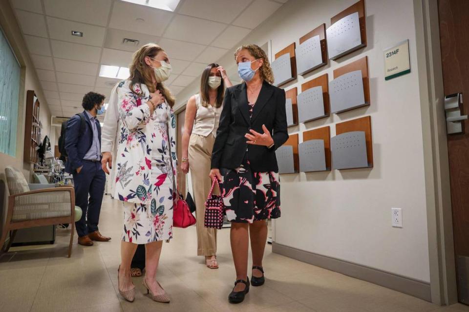 U.S. Rep. Debbie Wasserman Schultz, right, speaks with Dr. Felicia Knaul, a breast cancer survivor and researcher at Sylvester, during a tour of the Sylvester Comprehensive Cancer Center at the University of Miami on Tuesday, March 14, 2023, in Miami.